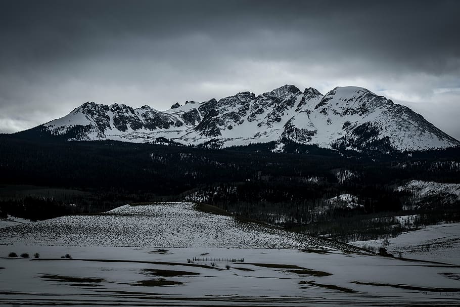 mountain covered in snow under gray clouds, highland, sky, summit HD wallpaper