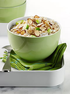 round green ceramic bowl of cooked food beside silver spoon HD wallpaper