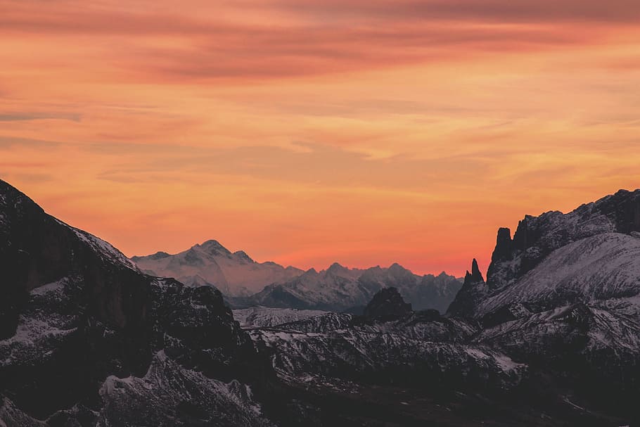 silhouette photography of mountains, snow covered mountain during golden hour in panoramic photography HD wallpaper