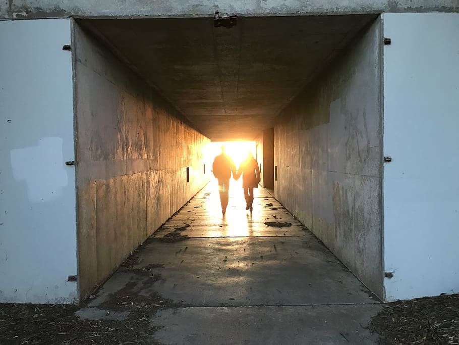 tunnel, silhouette, light, underground, mystery, walking, person HD wallpaper