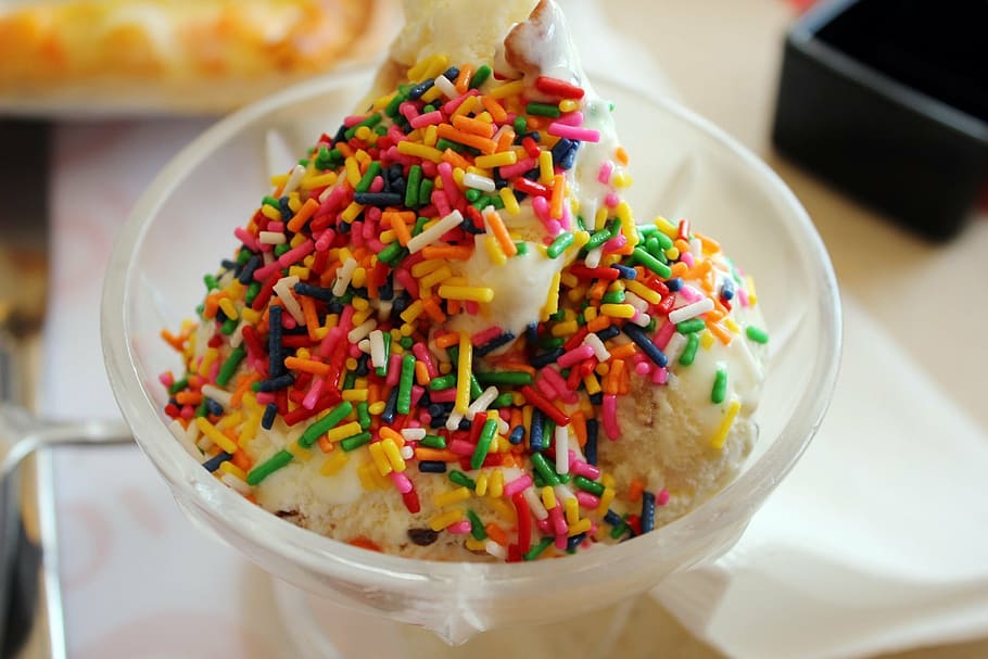 ice crushed topped with rainbow candies, ice cream, candy, sprinkles