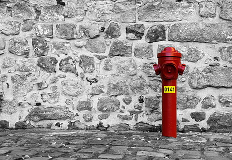 red fire hydrant beside gray wall, stone, background, water HD wallpaper