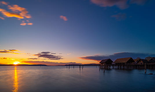 brown hut in the middle of body of water, sunset, waters, dusk HD wallpaper