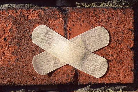 two gray band aids on brown concrete brick, bricks, patch, stone HD wallpaper