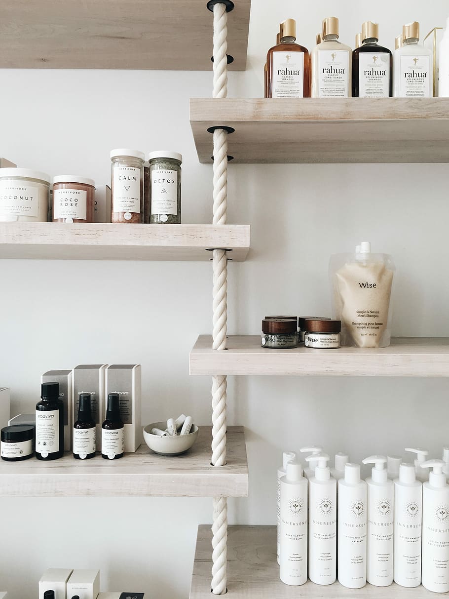 assorted color containers on top of shelves, haircare, skincare
