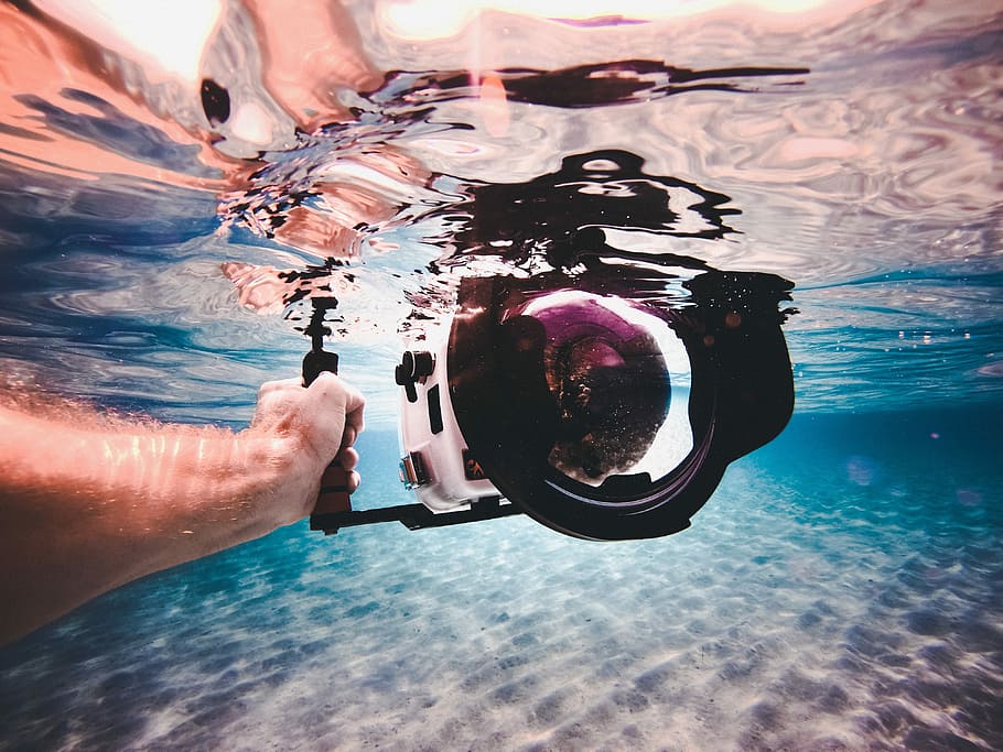 underwater photography of person holding white camera, sea, snorkeling, HD wallpaper