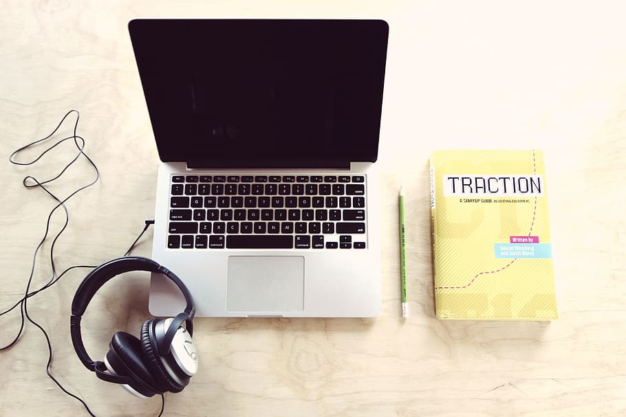 MacBook Pro, headphones and traction book, laptop, computer HD wallpaper