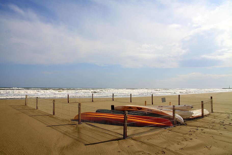 orange and white kayak inside the fence on seashore, Sand, Beach HD wallpaper