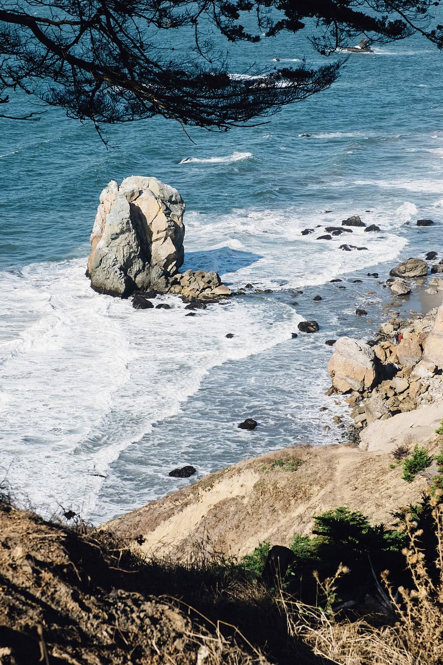 aerial photography of person climbing mountain, landscape photography of sea waves with rock formation HD wallpaper