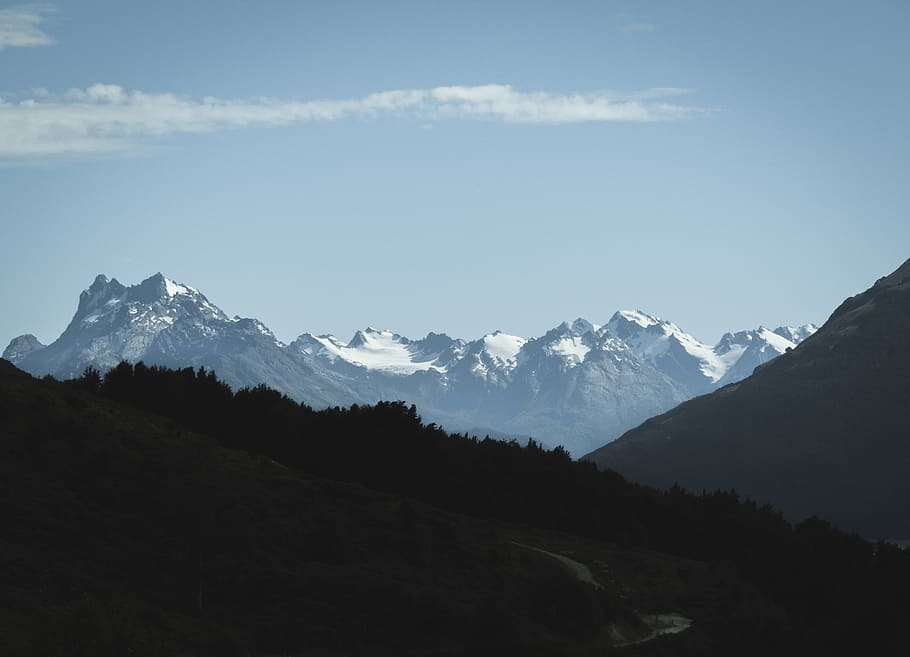 photo of mountain during daytime, snow capped mountain under white clouds and blue sky HD wallpaper
