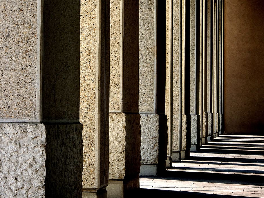 Photo of gray concrete posts during daylight, shadows, columns HD wallpaper