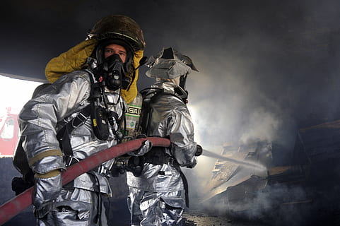 two firefighters holding hose, firemen, flames, smoke, water HD wallpaper