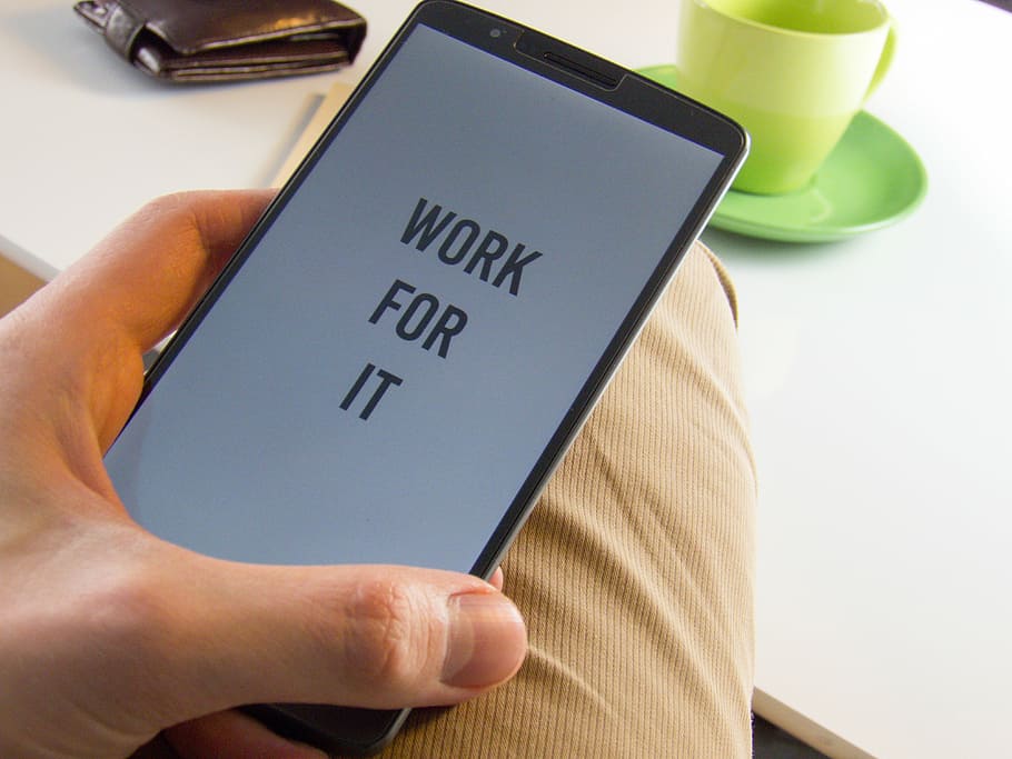 person holding smartphone flashing work for it text, motivation, HD wallpaper