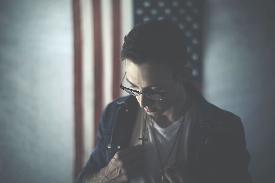 man holding his cross pendant, guy, eyeglasses, chains, fashion HD wallpaper