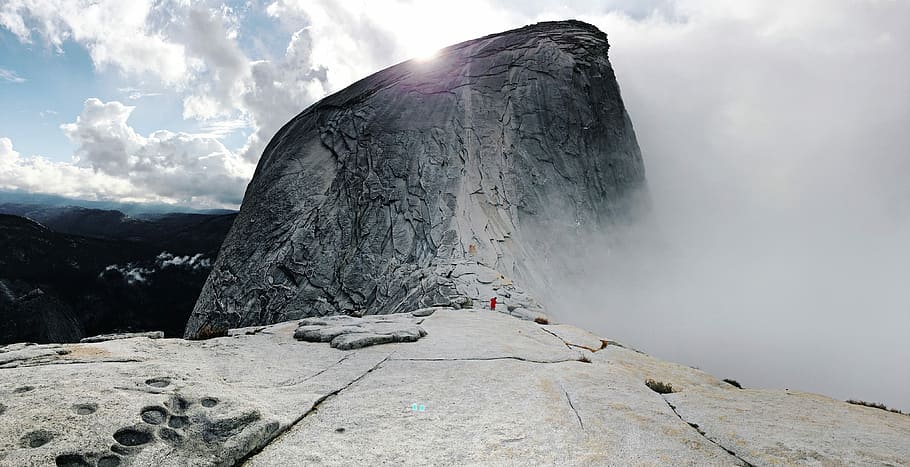timelpase photography of hill covered by fog, landscape photography of rock formation HD wallpaper