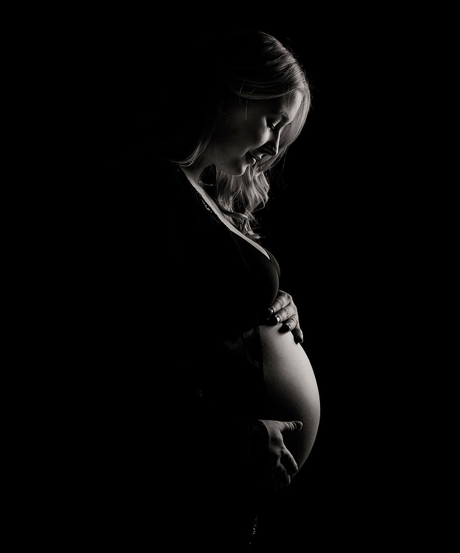 grayscale photo of pregnant woman touching her belly, dark, black, HD wallpaper