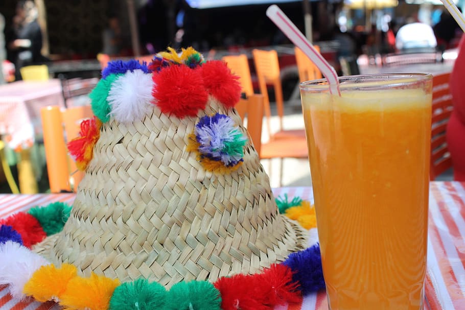 orange juice on clear highball glass, hat, morocco, street HD wallpaper