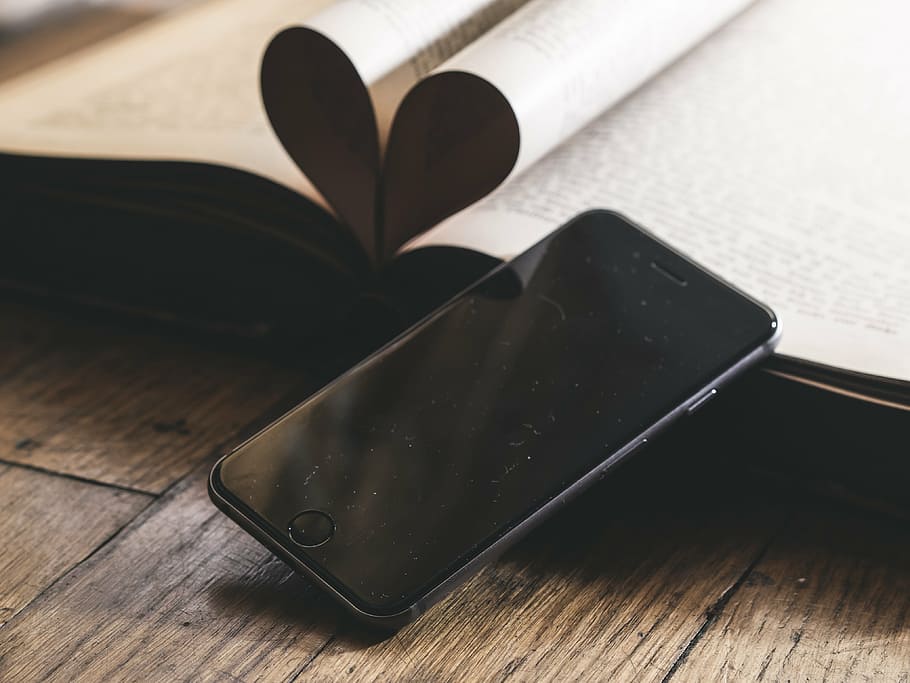 space gray iPhone 6 leaning on book, love, heart, romance, color, HD wallpaper