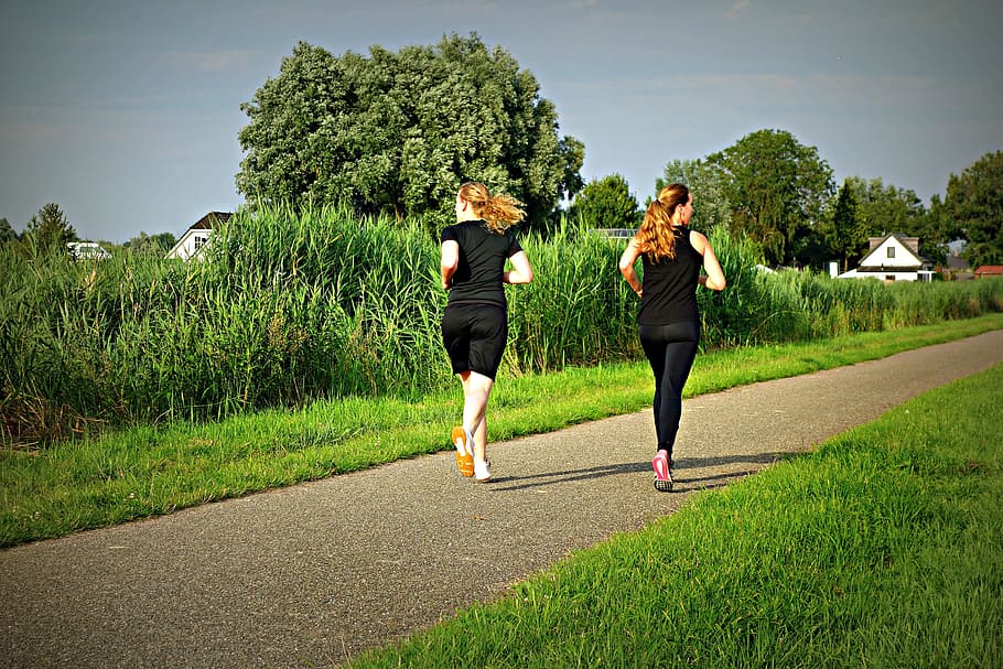 two women in black tops and bottoms running on grey trail, jogging, HD wallpaper