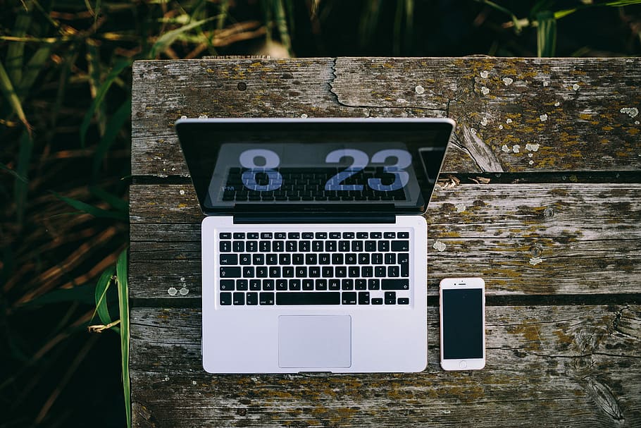 Man working on Macbook at lake, workspace, workplace, computer HD wallpaper