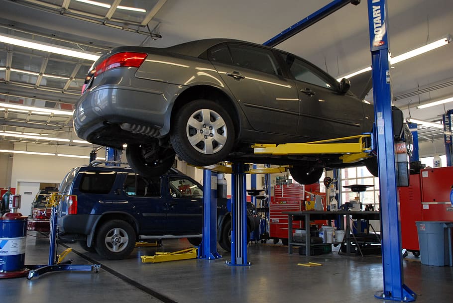 gray sedan on automotive raiser, car, mechanic, automobile, service
