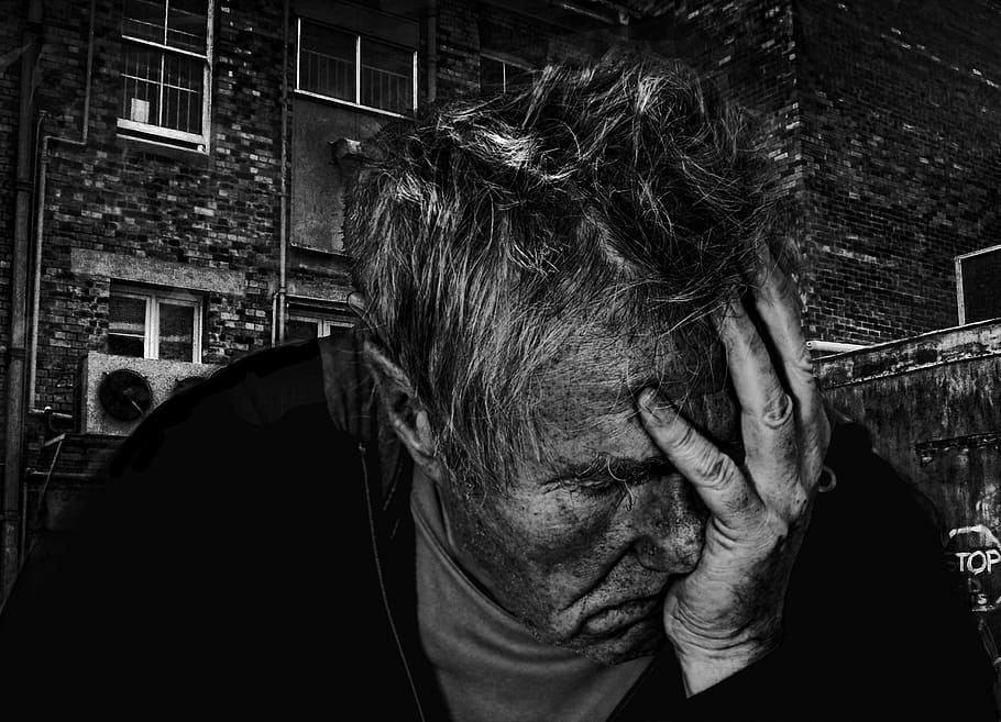 grayscale photograph of man, desperate, despair, depressed, hopeless