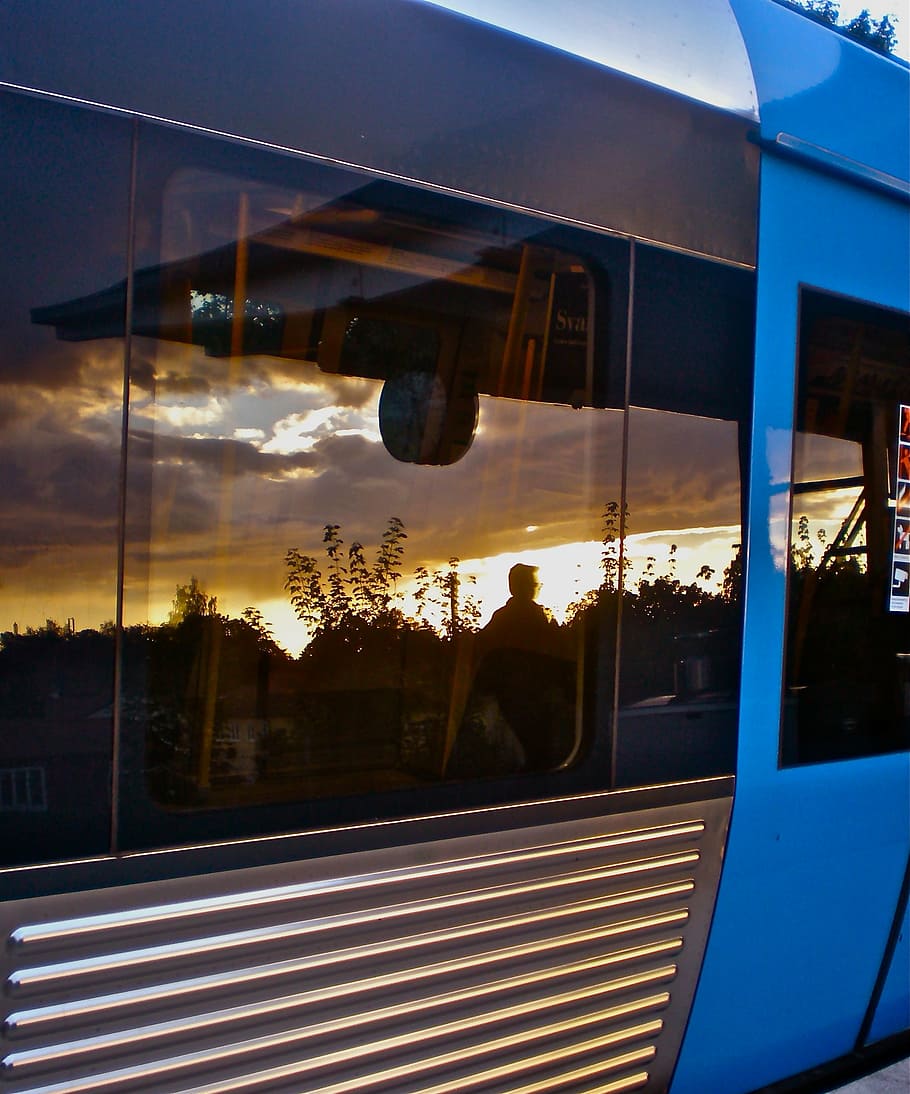 metro, mirroring, horizon, sunset, mode of transportation, window HD wallpaper