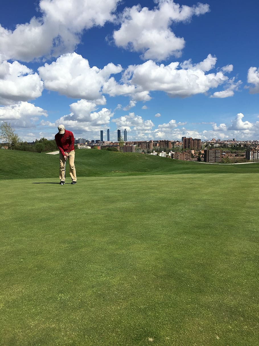 man doing golf under cloudy sky, spain, landscape, green, sport HD wallpaper