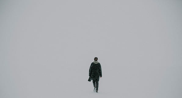 man walking on white surface, person with scarf walking on snow filled area HD wallpaper