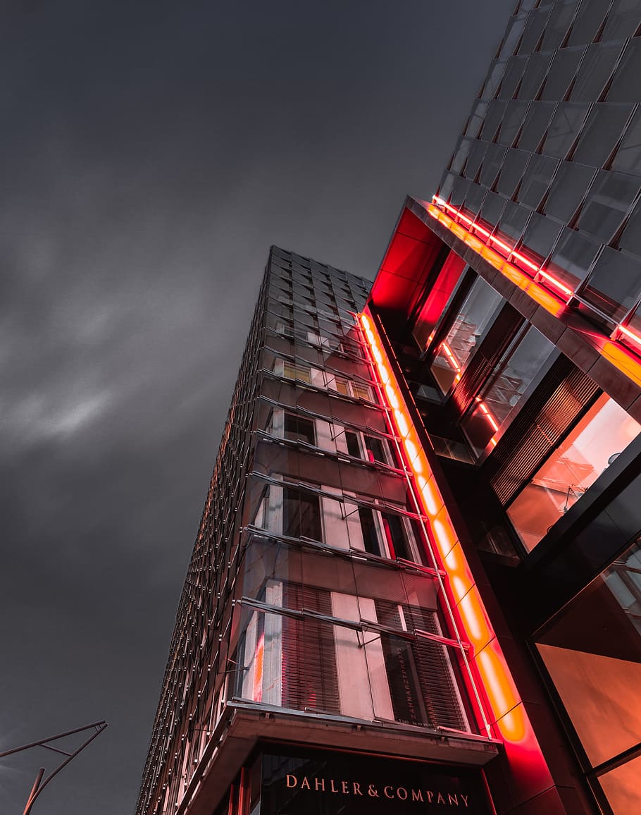 low angle photo of buildings, high-rise concrete building during daytime HD wallpaper