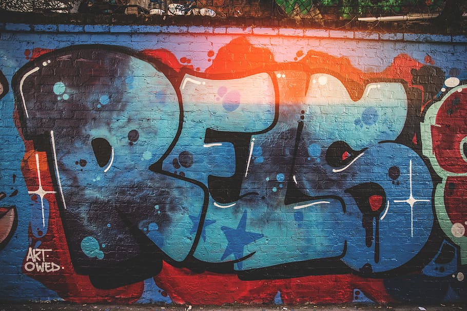 A brick wall covered in graffiti, urban, street Art, illustration