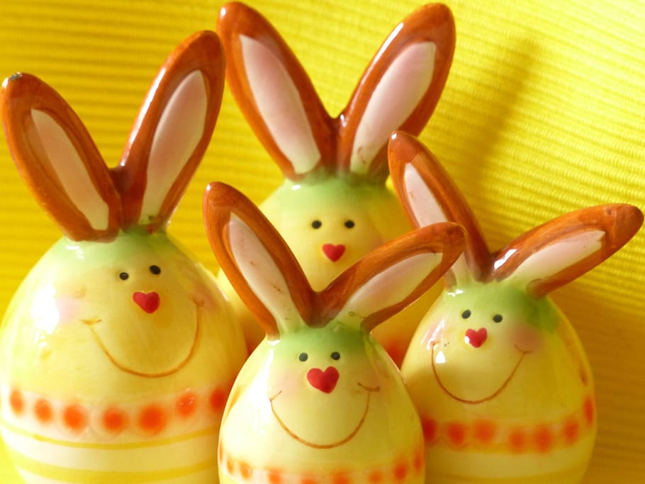 four yellow-and-brown ceramic rabbit figurines, hare, easter bunny HD wallpaper