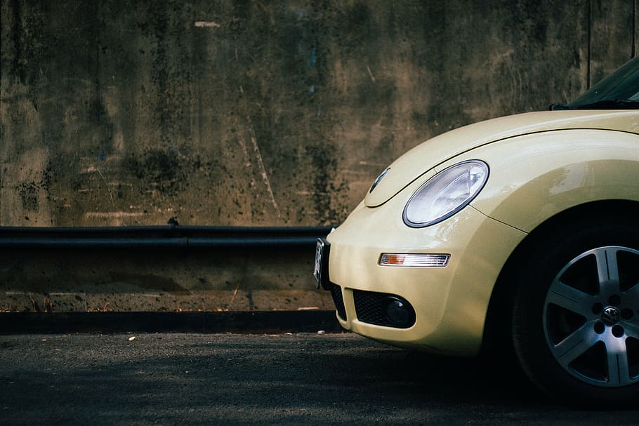 yellow Volkswagen New Beetle parked on side of street, asphalt HD wallpaper