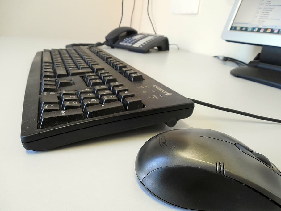 gray and black computer mouse beside keyboard, phone, desk HD wallpaper