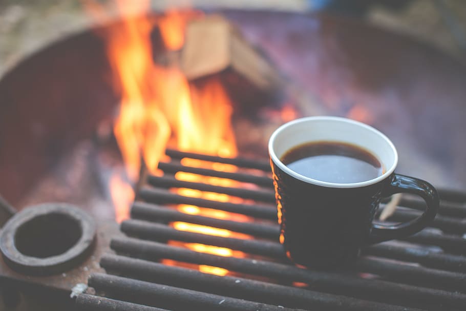 coffee in cup on black steel griller, ceramic, mug, fire, pit