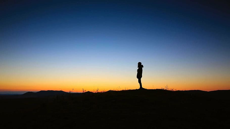 silhouette of person standing on the cliff, sunset, peace, solitude HD wallpaper