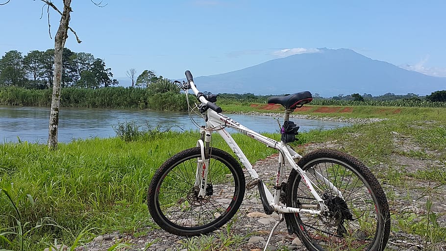 bicycle, river, mountain, transportation, water, plant, nature HD wallpaper