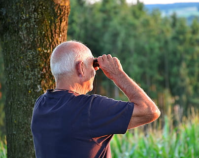 man in blue crew-neck shirt white using binocular, senior, male HD wallpaper