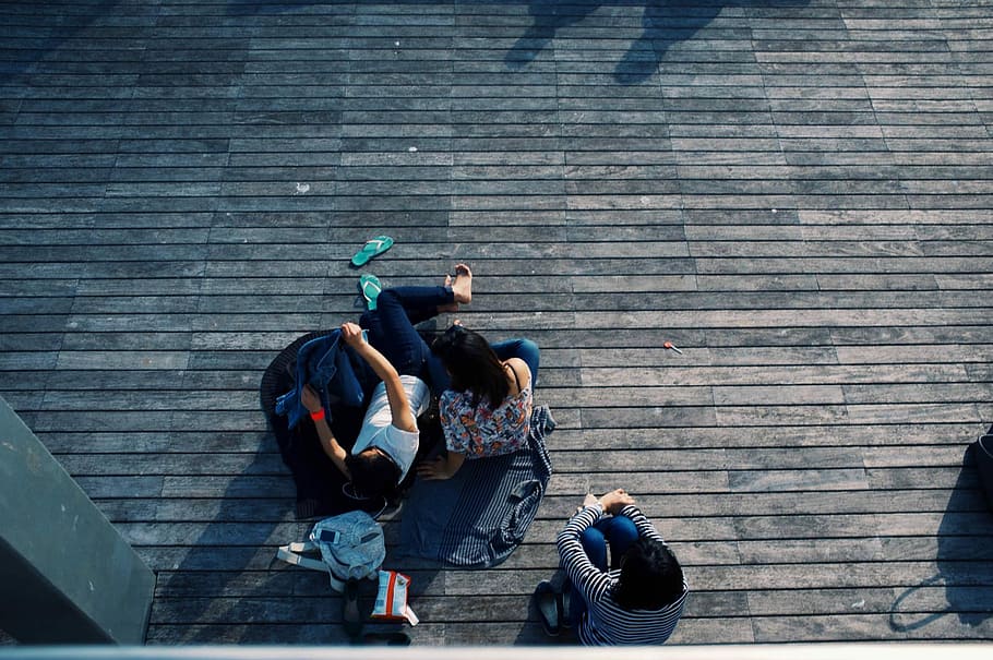 3 people sitting on brown wooden floor at daytime, dock, urban Scene HD wallpaper