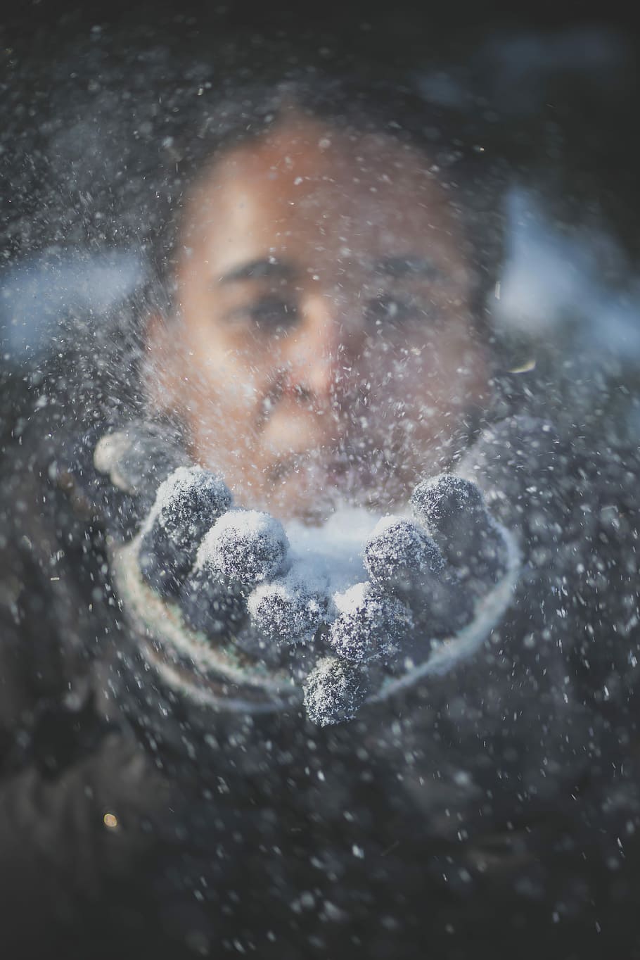 Outside enjoying the winter snow, woman taking picture in front of glass panel HD wallpaper