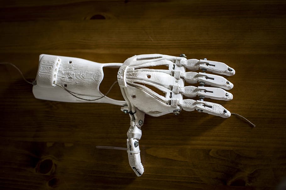 white prosthetic arm on brown wood surface, prostetic, proteza, HD wallpaper