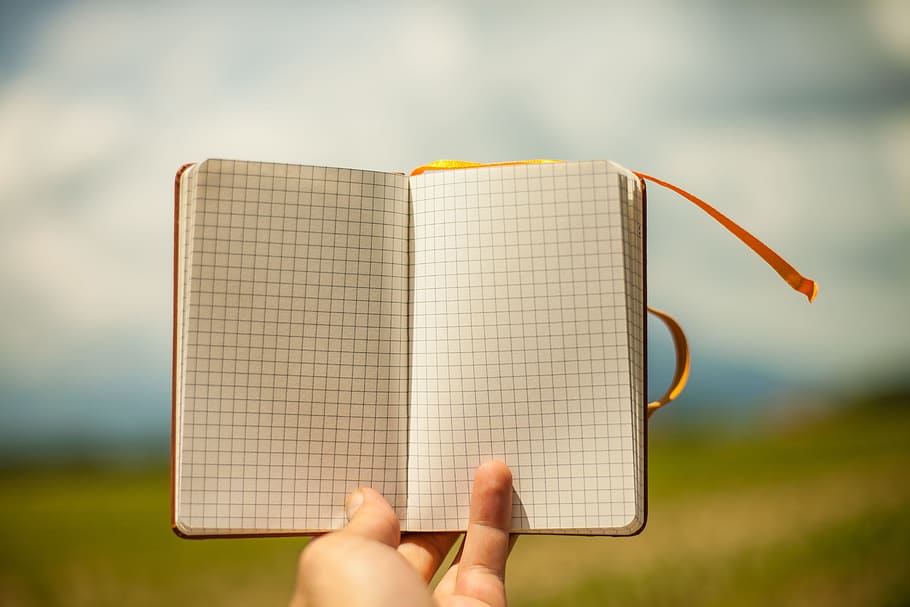 person holding booklet, notepad, hand, checkered, notes, paper HD wallpaper