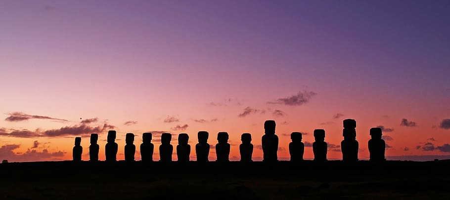 panoramic photo of Moai statues during golden hour, chile, easter island