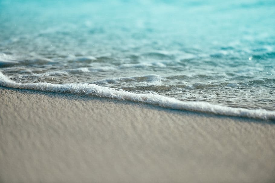 white sand, closeup photography of ocean foam on shore, beach