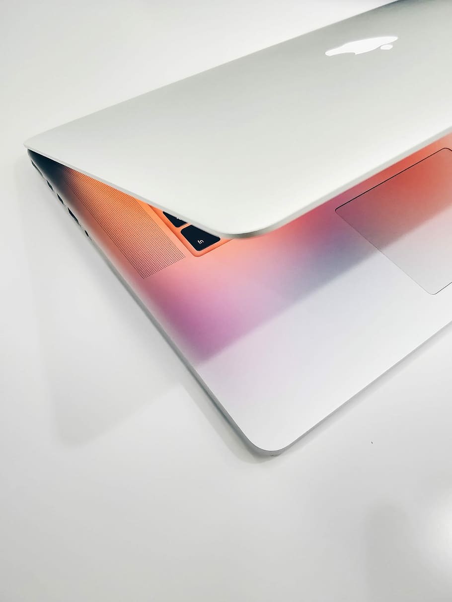 Apple MacBook air on wooden surface, MacBook Pro turned on, laptop, HD wallpaper