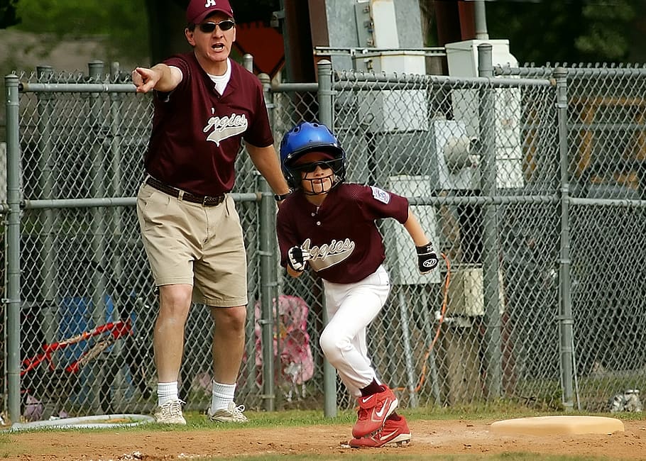 boy playing baseball game, runner, coach, little league, sport