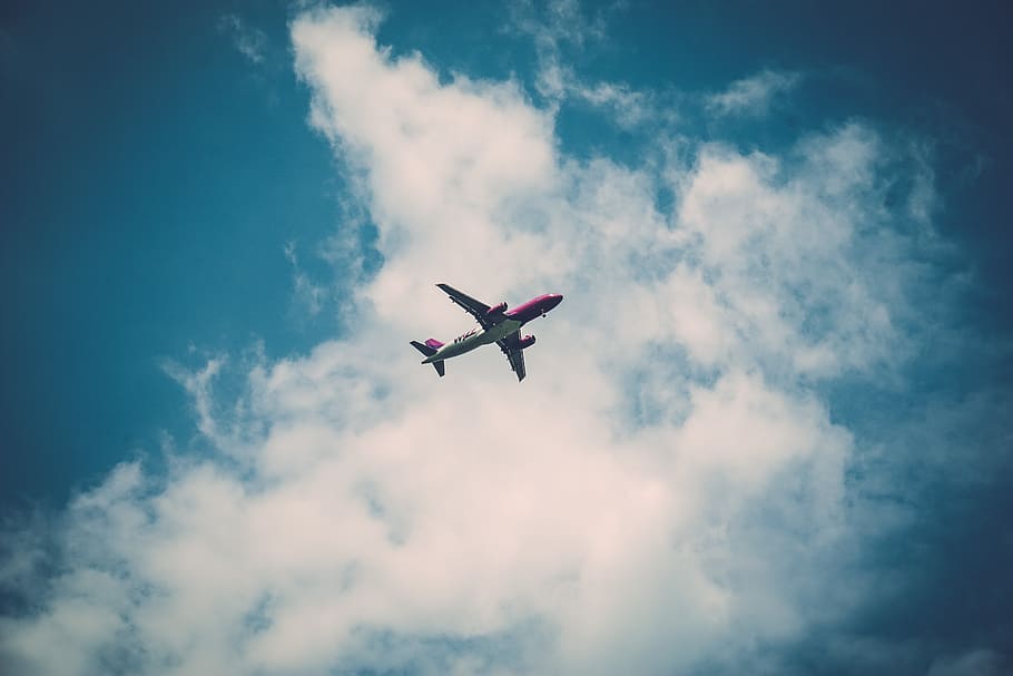 low angle photography of plane flying with cloudy sky, airplane HD wallpaper