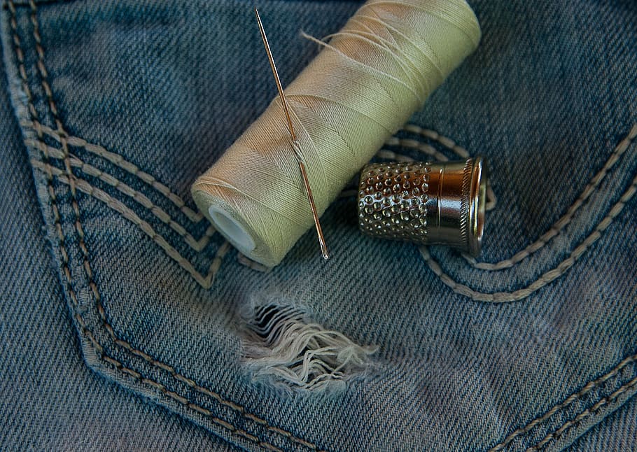 gray needle on beige thread, pants, jeans, old, worn, hole HD wallpaper
