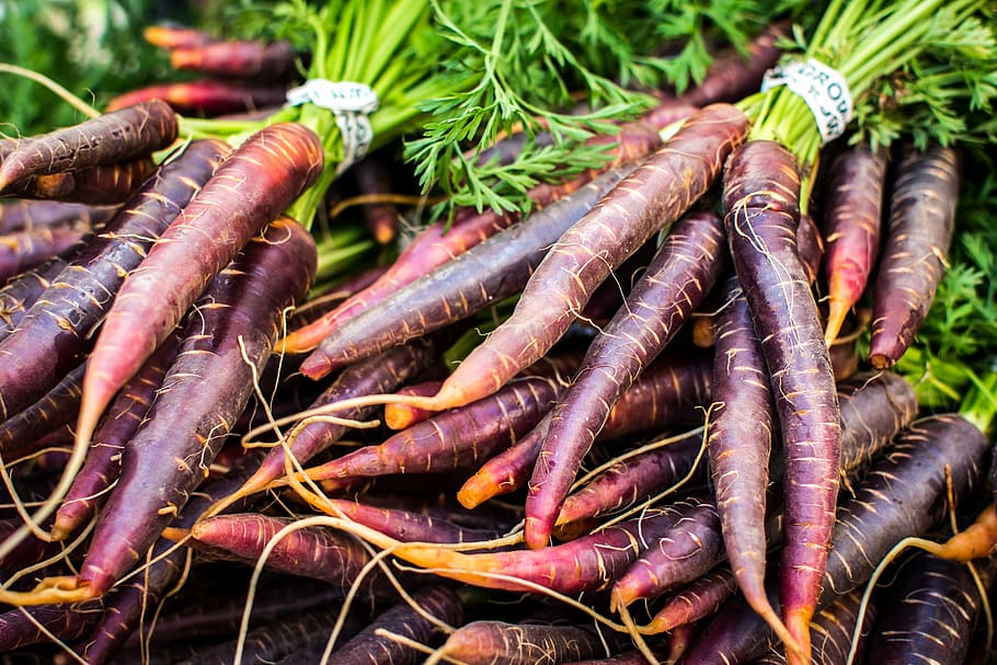 Red carrots at farmers market, close up, colorful, food, freshness