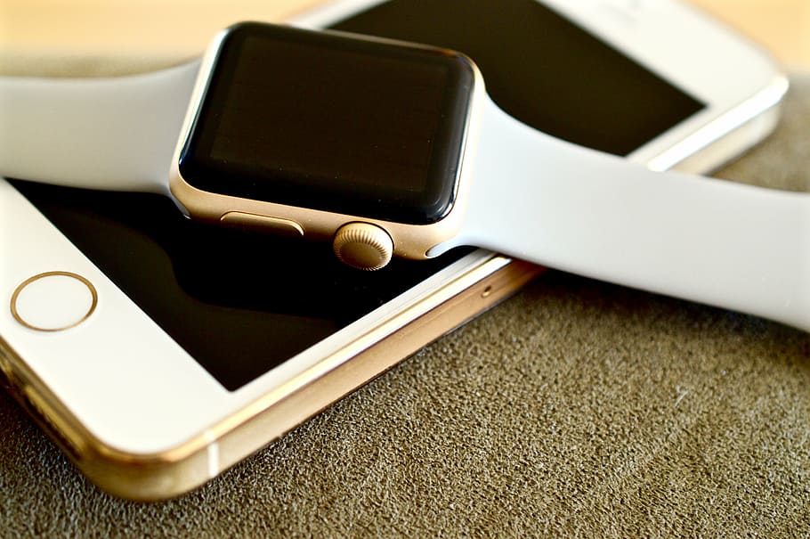 gold aluminum case Apple Watch on gold iPhone, technology, modern